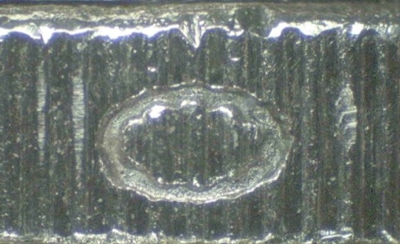 Ovale Form im geriffelten Münzrand